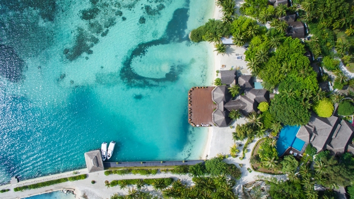 Adaaran Select Hudhuranfushi Maldives Water sports centre beach boats jetty and swiming pool