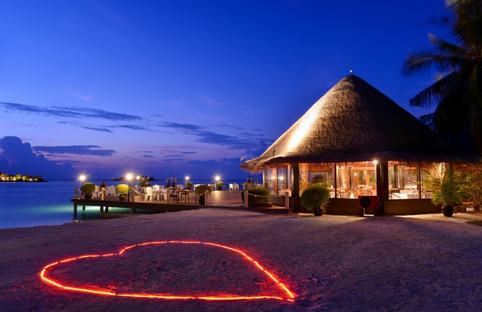 Lit up heart on beach