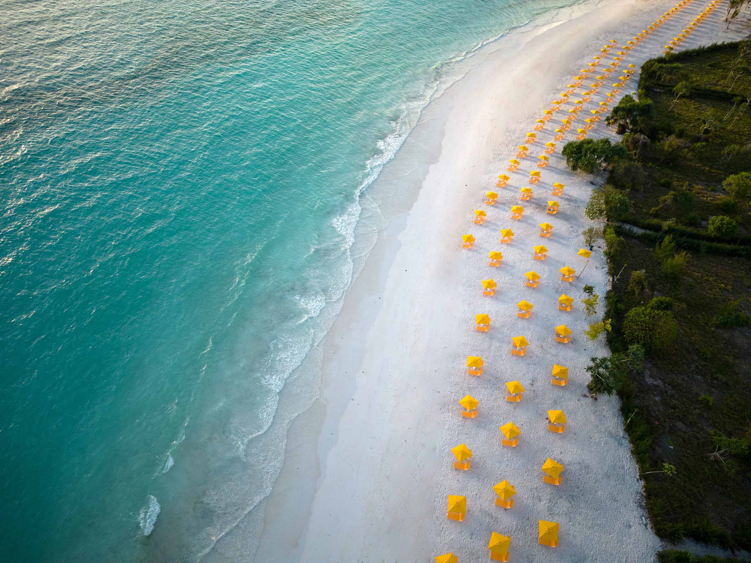 The Mora Zanzibar Yellow Umbrella Beach