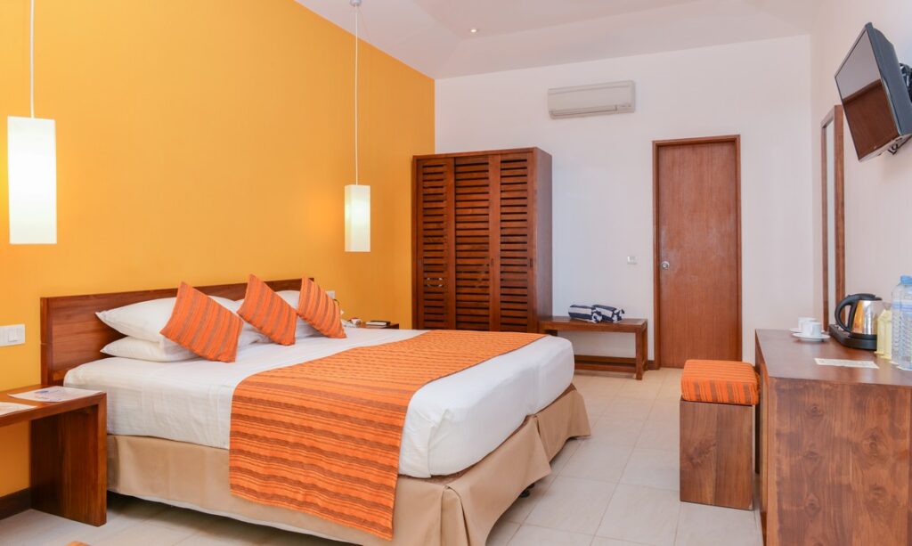 orange room twin bed adaaran select hudhuranfushi maldives