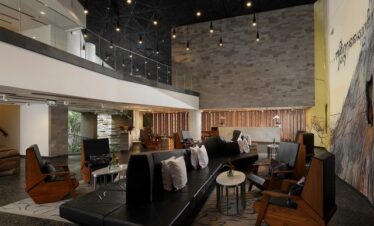 Modern lobby at Maya Sanur Resort with elegant seating and open spaces