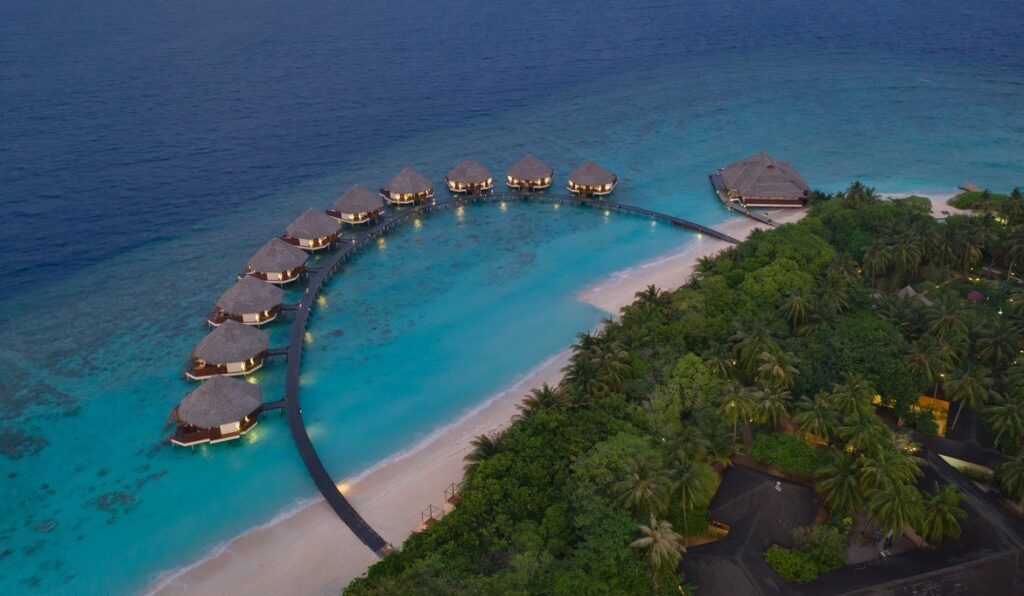 Aerial view of overwater bungalows at Adaaran Meedhupparu resort
