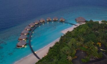 Aerial view of overwater bungalows at Adaaran Meedhupparu resort