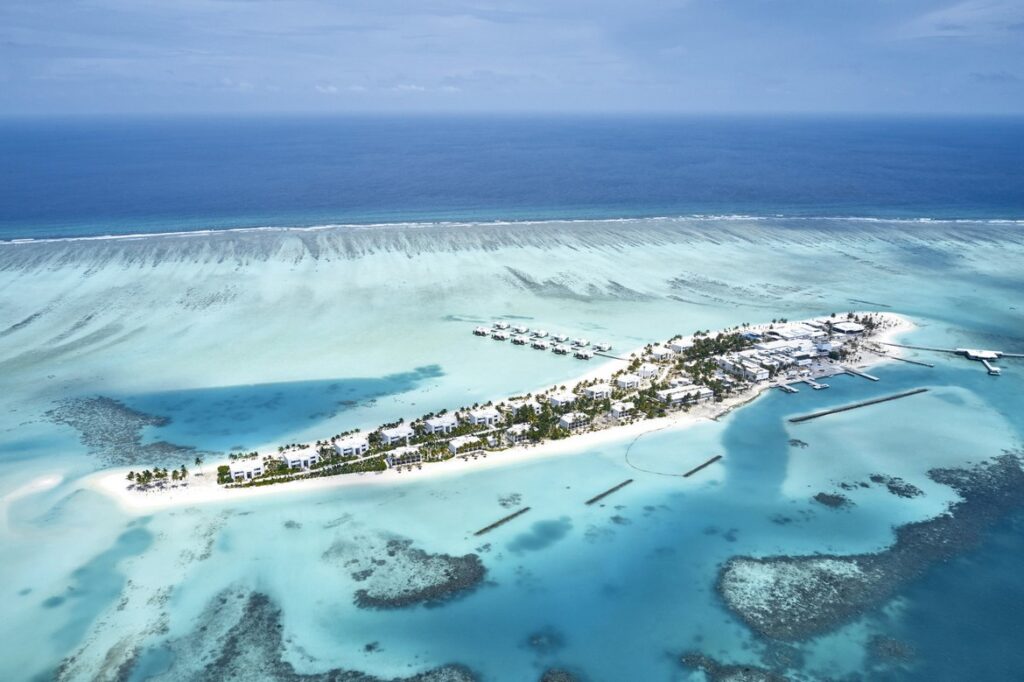 Aerial view of the island and surrounding ocean at Riu Atoll