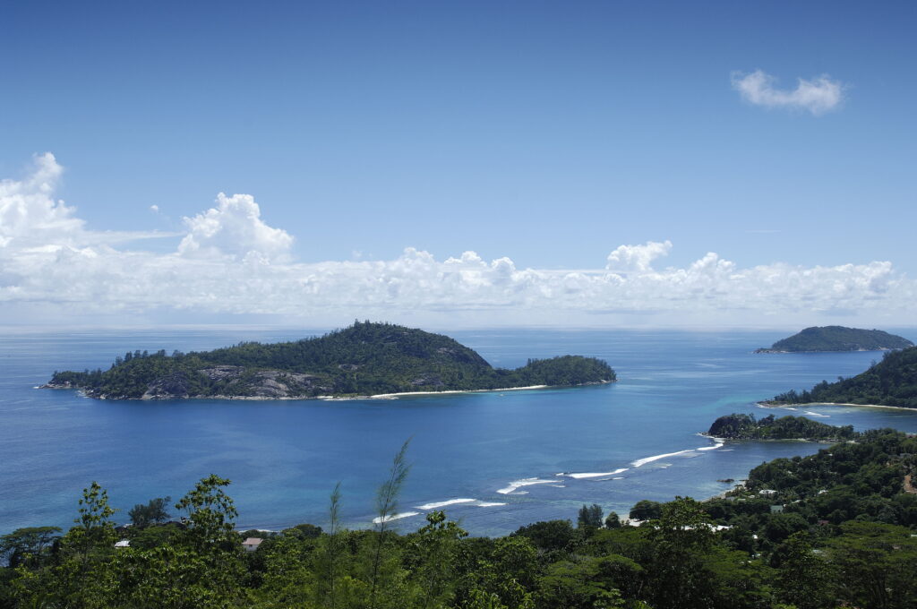 Aerial view of the stunning islands and ocean surrounding Berjaya Beau Vallon