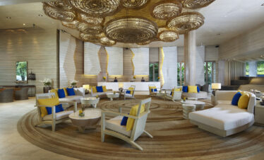 Amari Phuket lobby area featuring modern design with circular seating arrangements