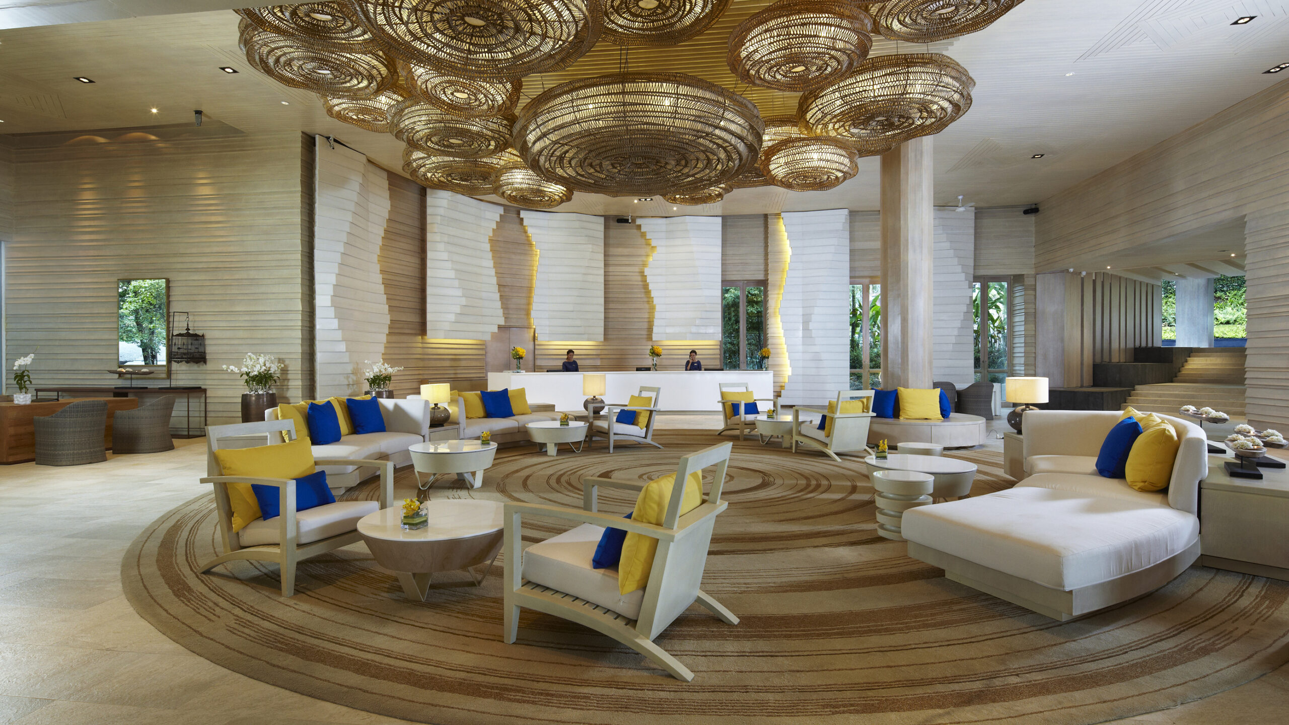 Amari Phuket lobby area featuring modern design with circular seating arrangements