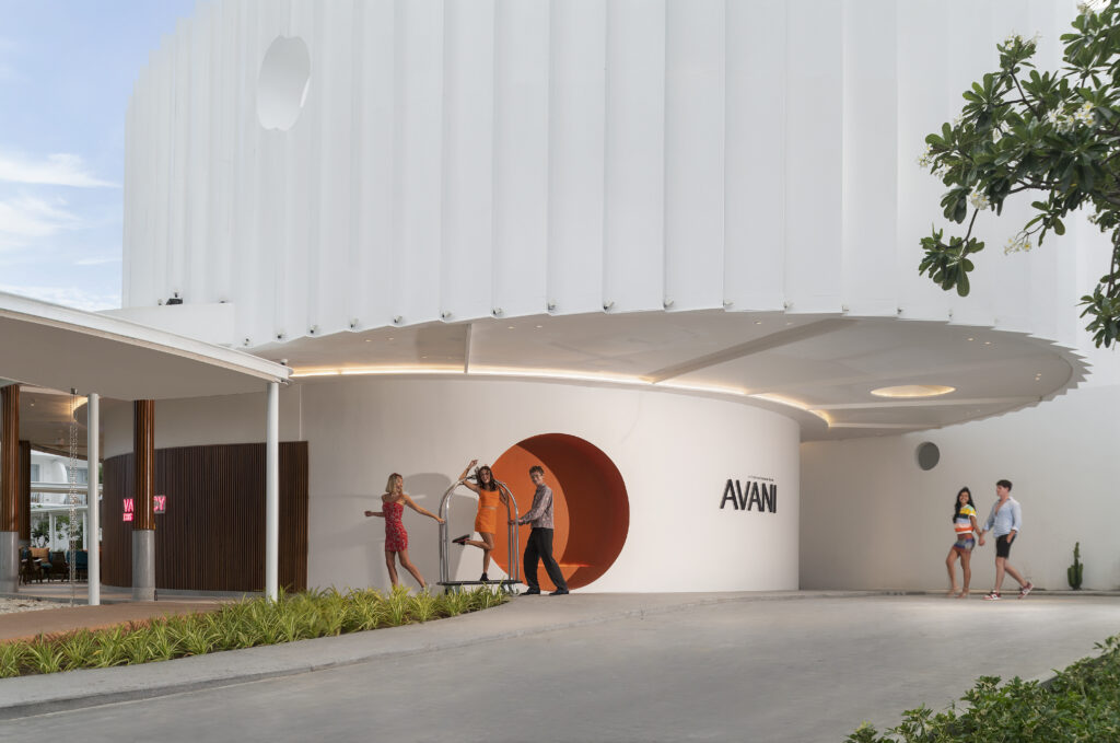 Avani Chaweng Samui entrance with modern architectural design guests enjoying a stylish arrival experience