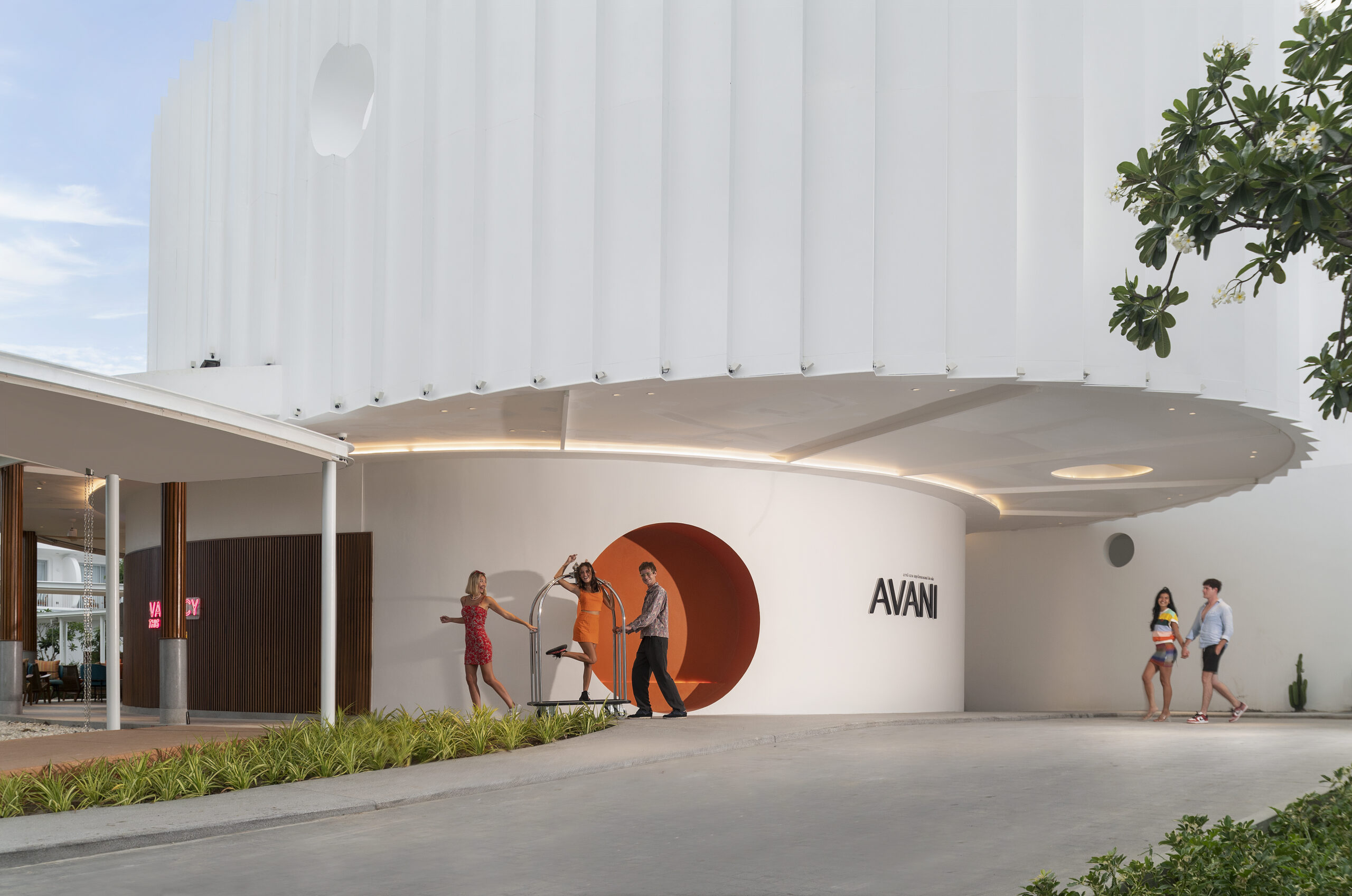 Avani Chaweng Samui entrance with modern architectural design guests enjoying a stylish arrival experience