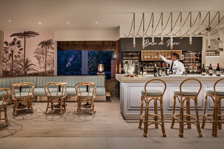 Bar area at Constance Belle Mare Plage with cozy seating
