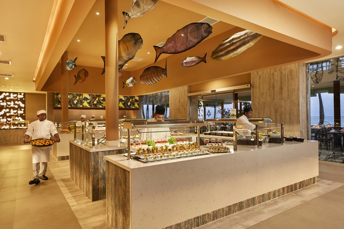 Buffet area with chefs preparing dishes at Riu Palace