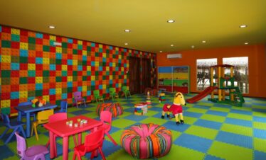 Colorful indoor play area at Meeru Island Resort for kids featuring vibrant decor and a variety of toys