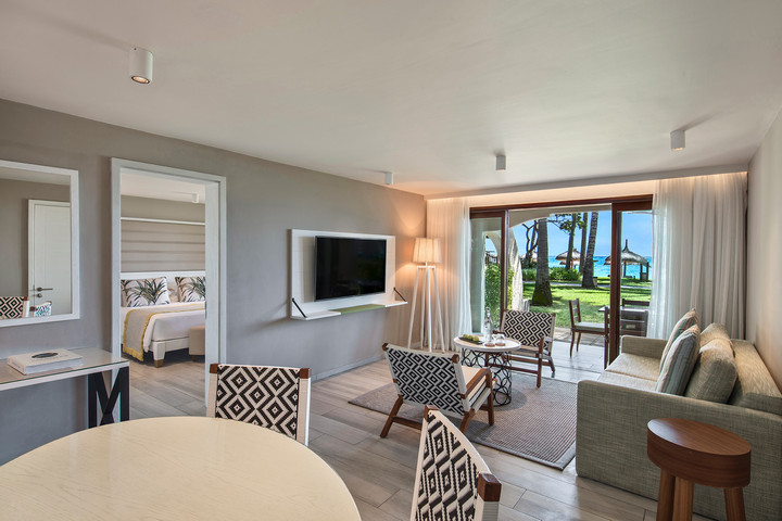 Constance Belle Mare Plage suite with garden view and modern living room leading to the terrace
