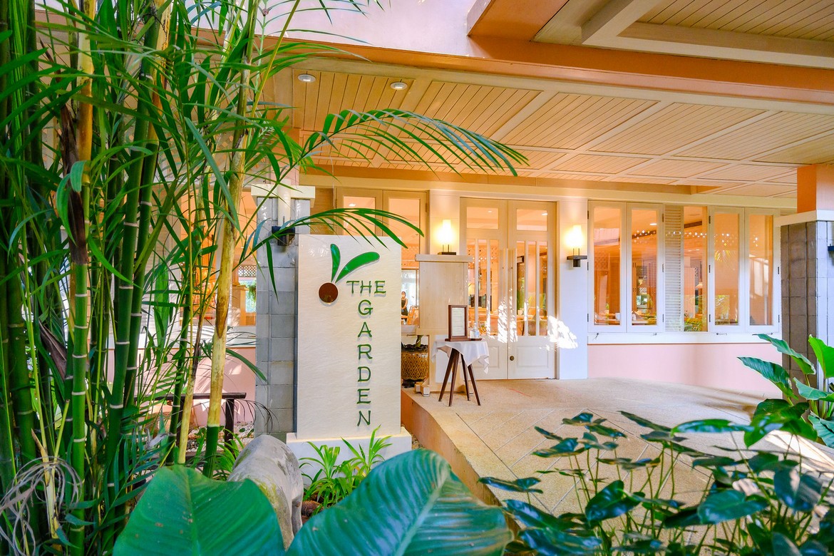 Entrance to The Garden restaurant at Khao Lak Merlin surrounded by tropical plants