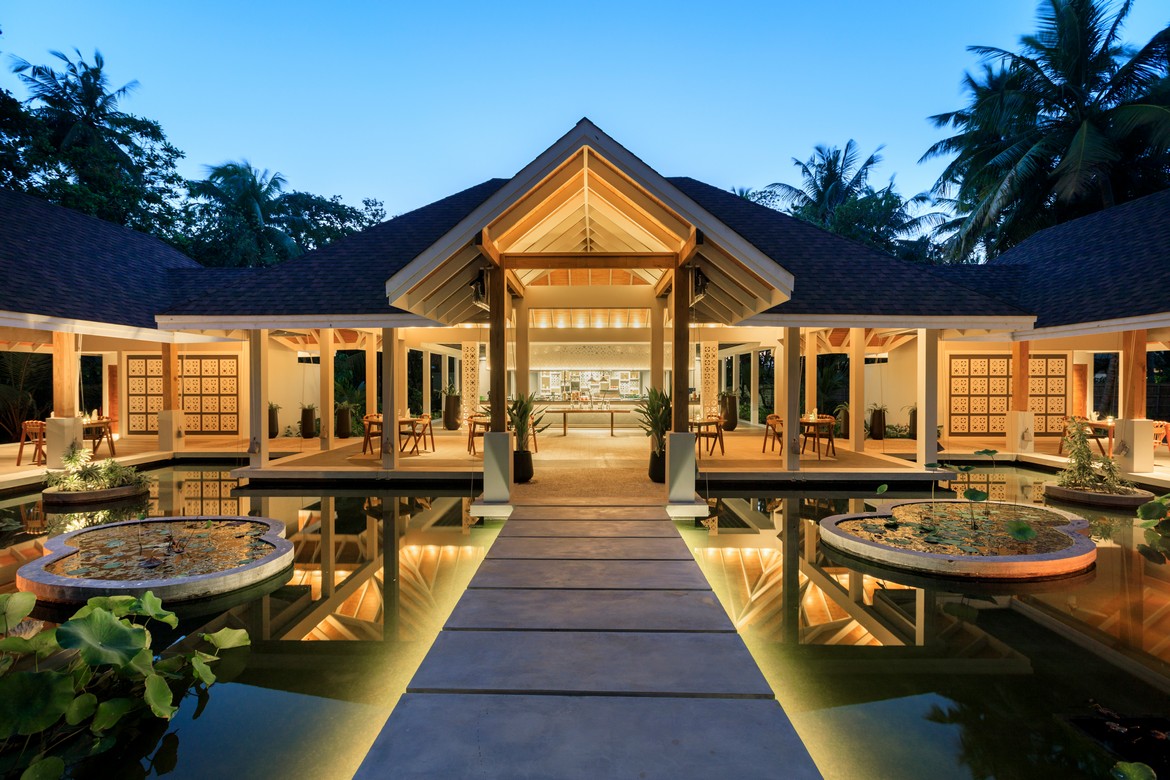 Evening view of Dhigali entrance with reflecting ponds