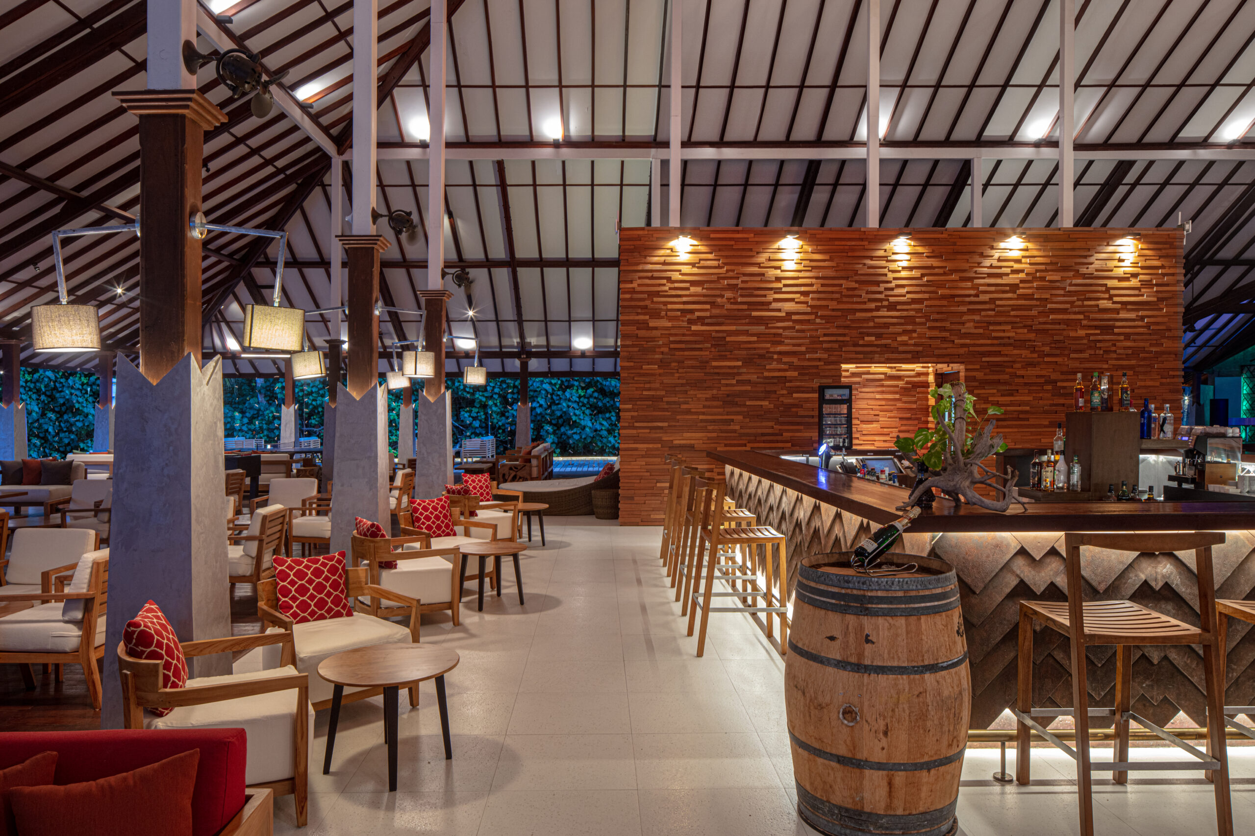 Indoor bar area at Adaaran Meedhupparu with wooden decor