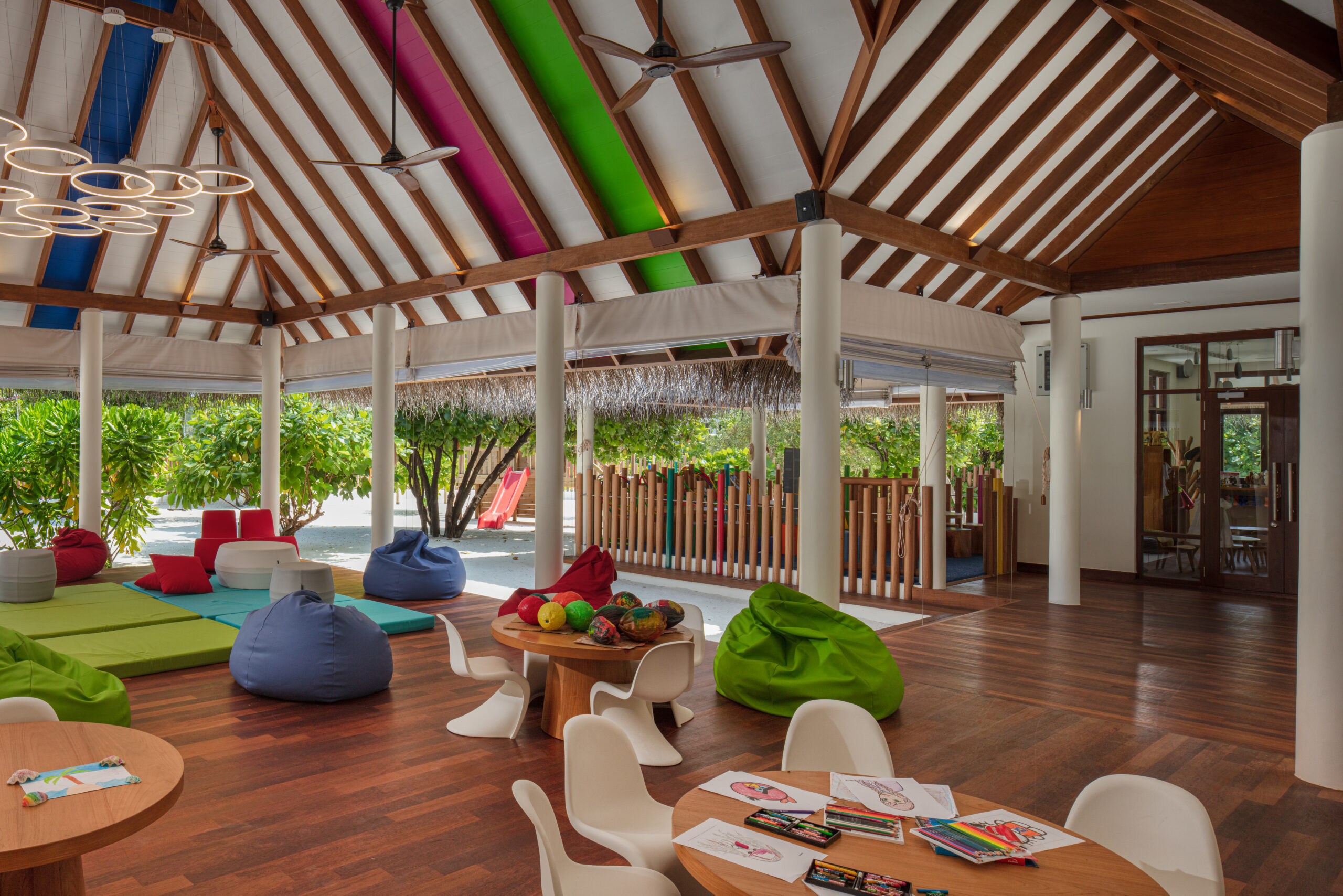 Kids club at Heritance Aarah with colorful ceiling accents and bean bags for fun indoor activities