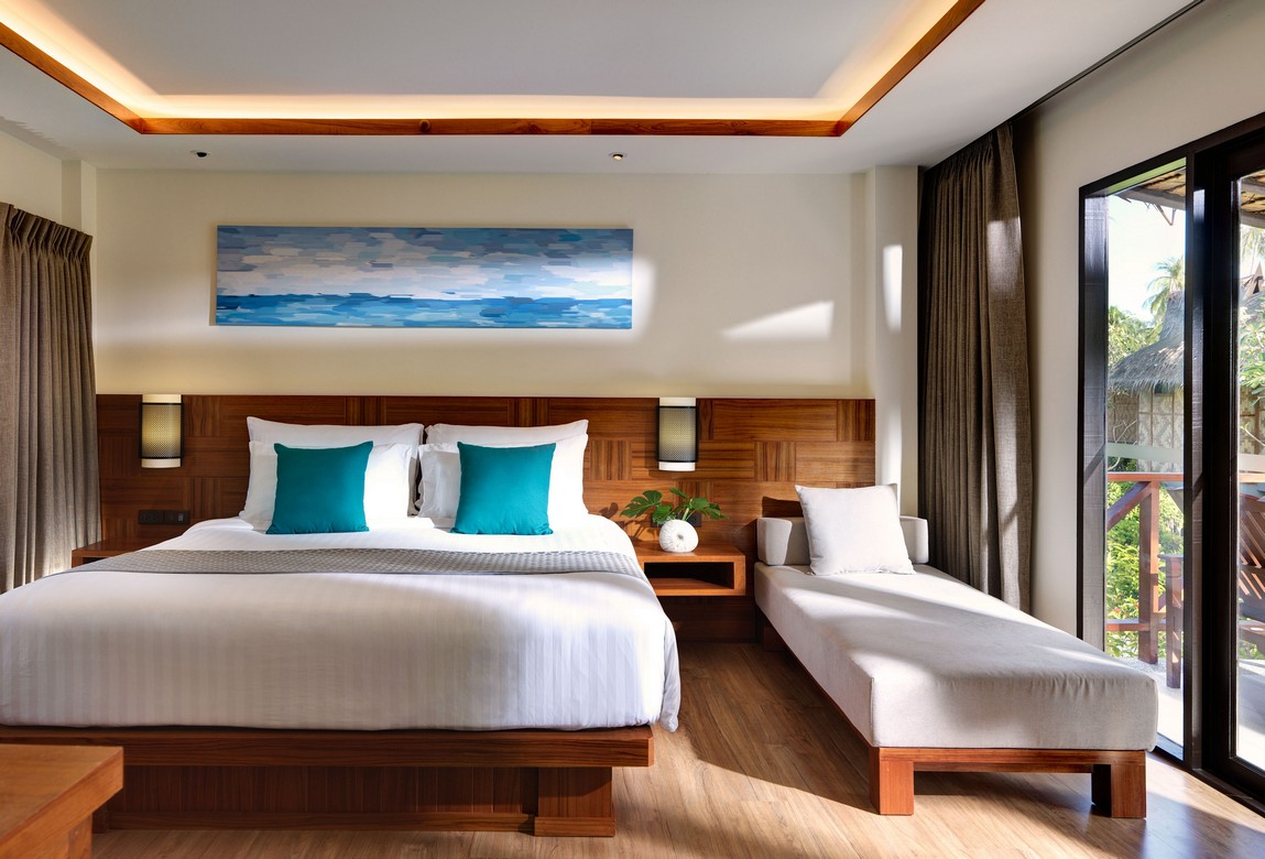 Modern bedroom with wood accents at Saii Phi Phi Island Village