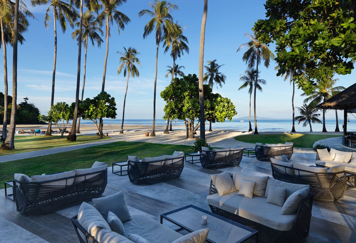Palm trees and ocean view from lounge area at Saii Phi Phi Island Village