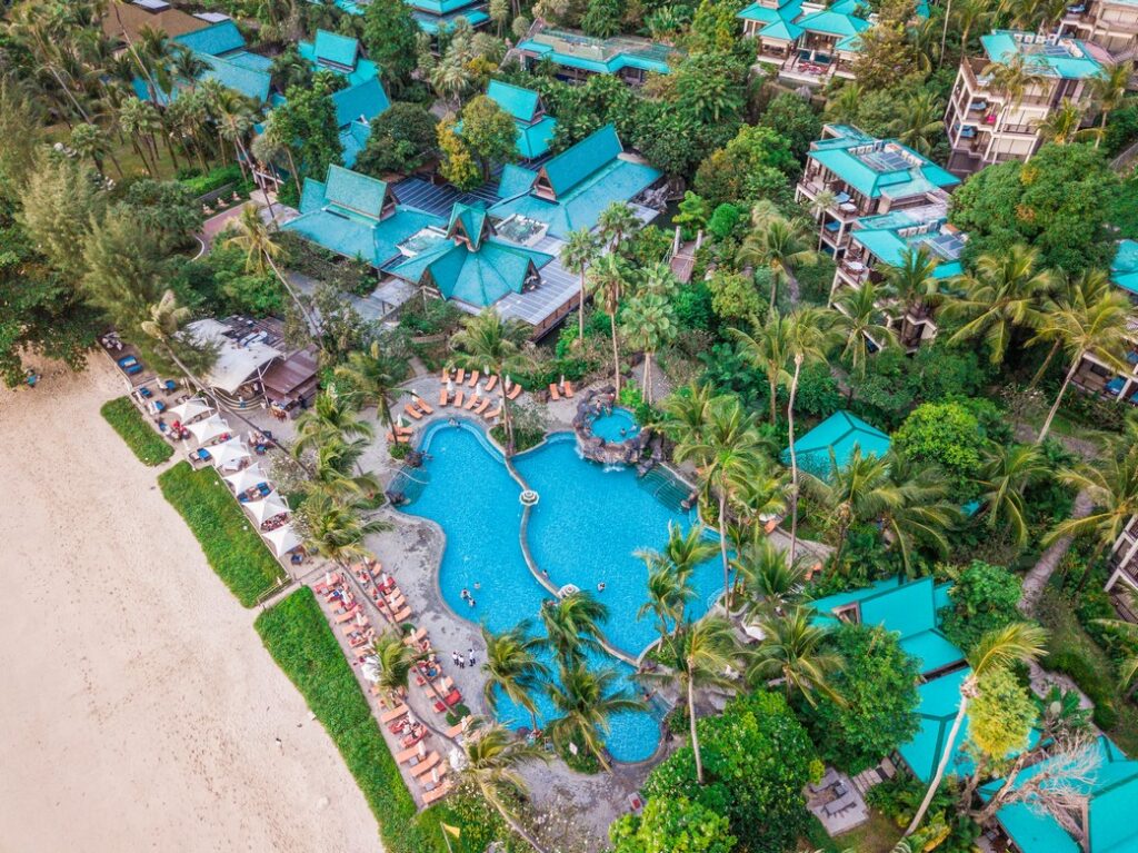 Pool area at Centara Grand Beach Resort near the sandy beach
