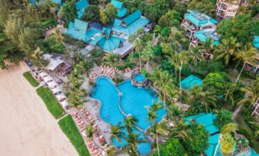 Pool area at Centara Grand Beach Resort near the sandy beach
