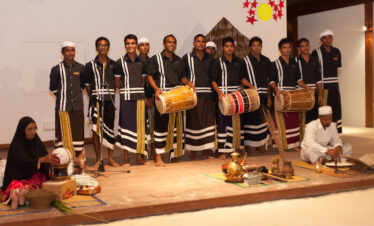 Traditional Maldivian drummers performing at Vilamendhoo showcasing the local culture and music