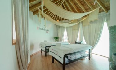 Tranquil spa treatment room at You and Me by Cocoon resort with natural decor