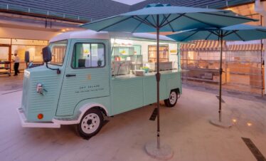 Vintage food truck at Joy Island serving guests