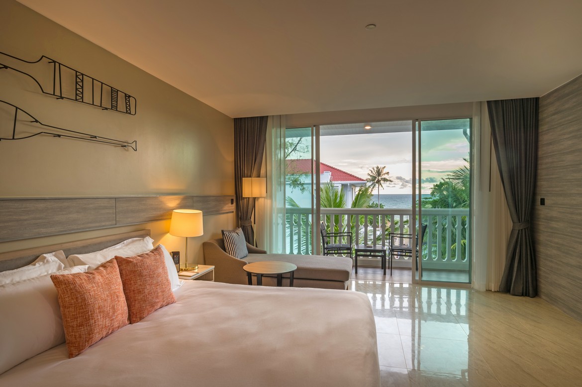 Comfortable Centara room with a view of the balcony overlooking the ocean