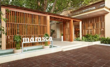 Entrance to Marasca Samui with stylish wooden decor
