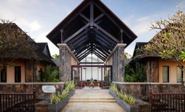 Front entrance of The Westin Turtle Bay Resort and Spa featuring stone pathways