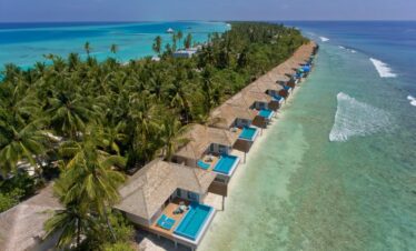 Kandima beach villas with private pools along the shoreline