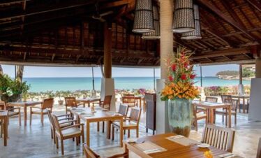 Katathani open air restaurant with beach views and elegant dining tables