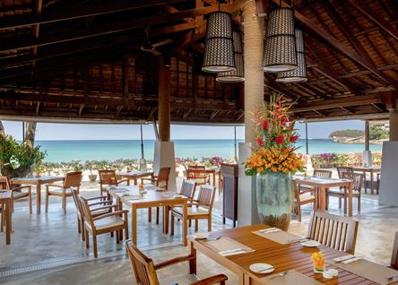 Katathani open air restaurant with beach views and elegant dining tables