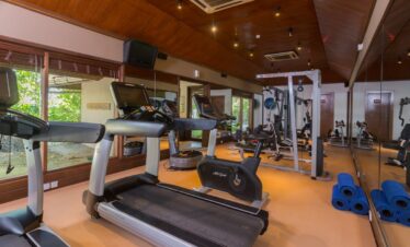 Modern fitness center at Veligandu island resort gym