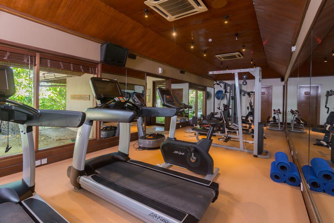 Modern fitness center at Veligandu island resort gym