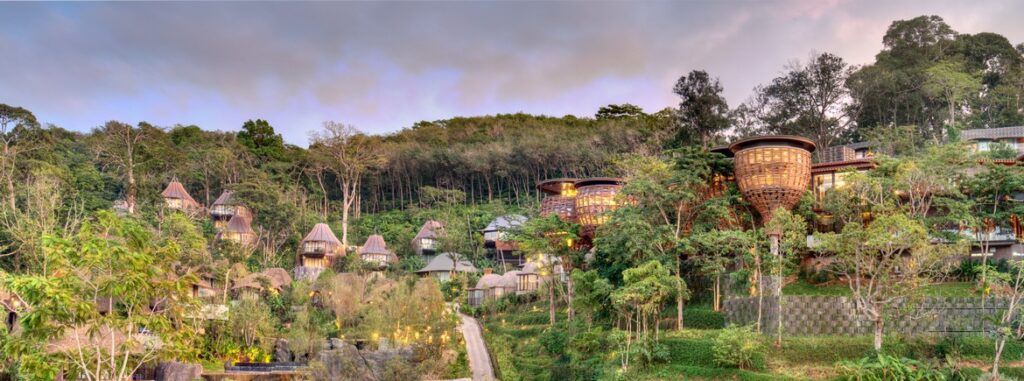 Panorama of Keemala resort featuring villas integrated into the lush hillside