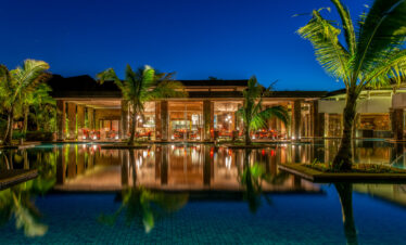 Pool scene with palm trees at The Westin Turtle Bay Resort and Spa reflecting serene resort ambiance