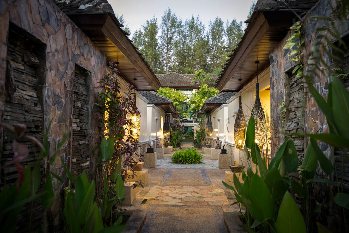 Stone pathway leading to a building at Robinson Khao Lak