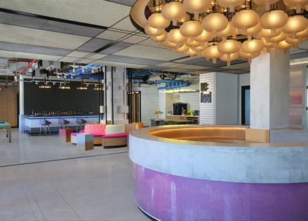 ALOFT BALI lobby with colorful decor and contemporary lighting
