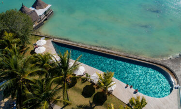 Aerial view of the pool and beach area at Veranda Paul & Virginie