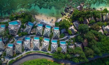 Beachfront relaxation at Hilton Seychelles Northolme Resort with clear waters