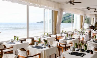 Beachfront restaurant at Coral Strand Hotel Seychelles with open windows