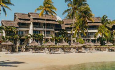 Beachfront view of the resort buildings at Veranda Paul & Virginie