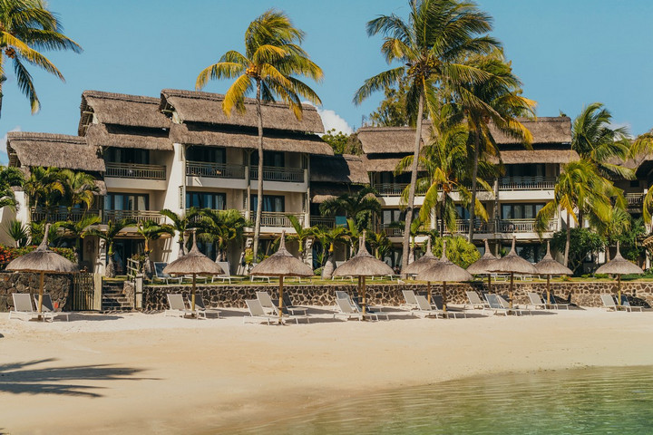 Beachfront view of the resort buildings at Veranda Paul & Virginie