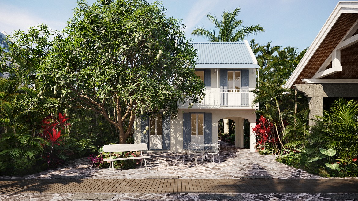 Charming outdoor seating area under a tree at Veranda Grand Baie