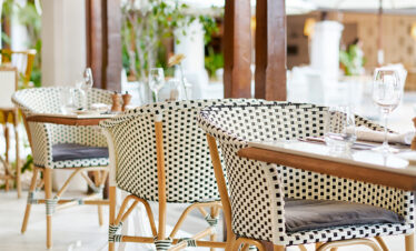 Chic dining chairs at a restaurant in Paradise Cove Boutique