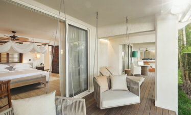 Cozy balcony seating at Paradise Cove Boutique