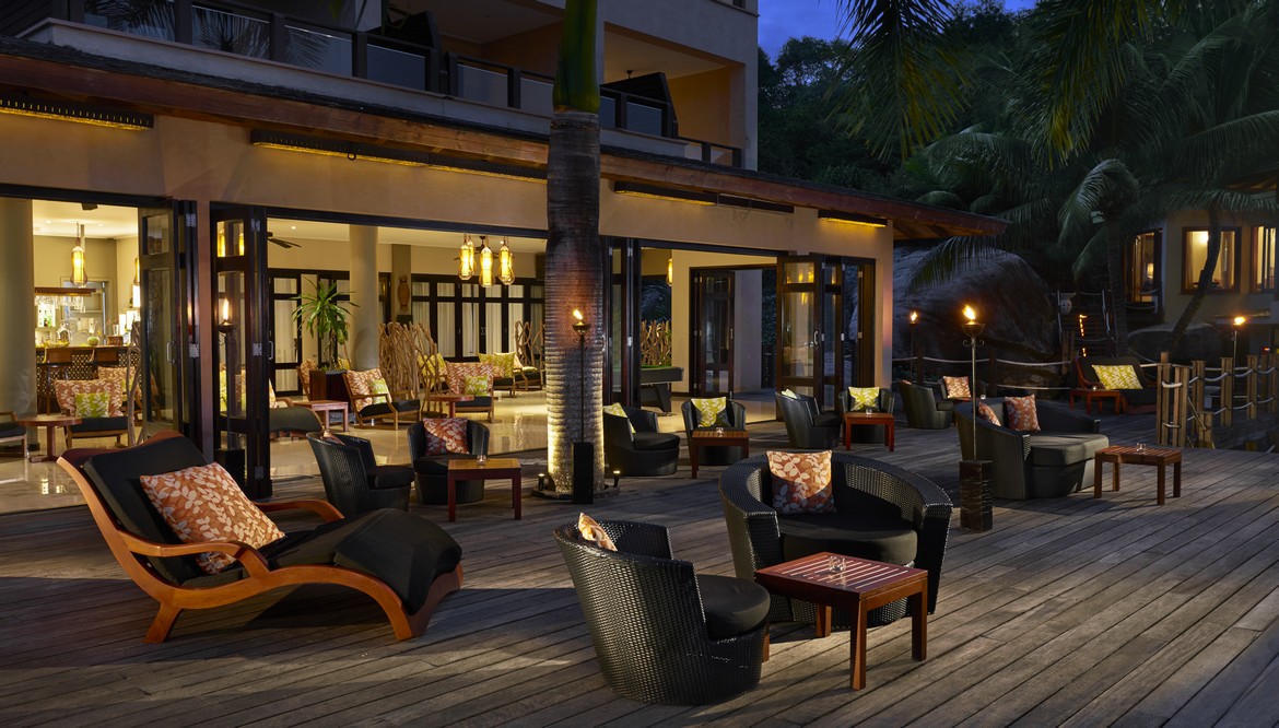 Cozy outdoor lounge at Doubletree by Hilton with warm lighting