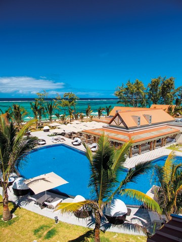 Crystals Beach Resort pool overlooking the turquoise ocean and beach setting